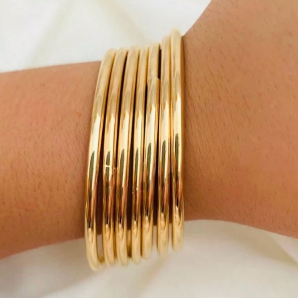 Elegant Gold Bangle Set.